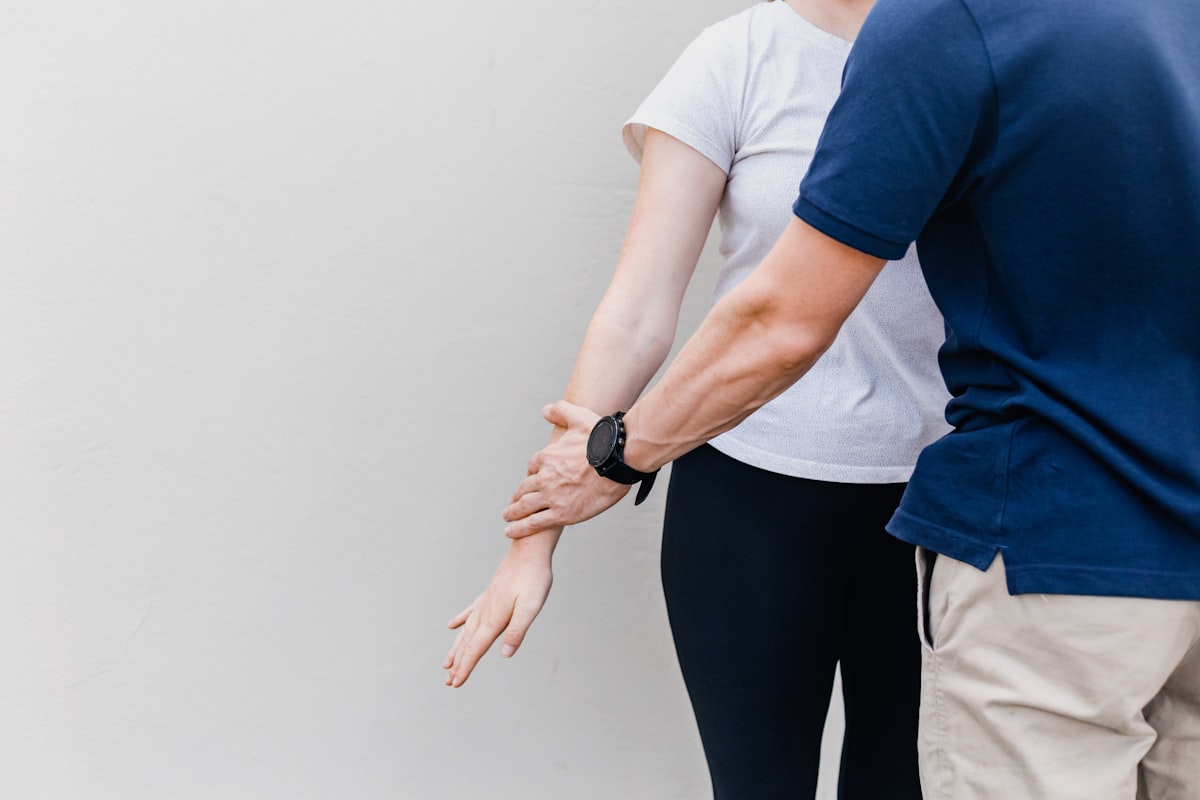 One-on-one movement guidance session in studio environment